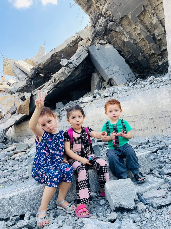 Children on rubble